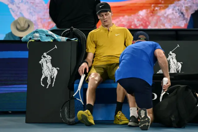 Jannik Sinner receives treatment