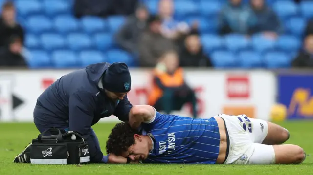Yousef Salech receiving treatment for injury