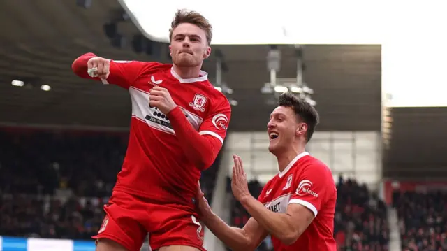 Tommy Conway of Middlesbrough celebrates scoring his team's fourth goal with teammate Dael Fry