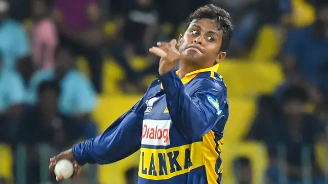 Jeffrey Vandersay bowling for Sri Lanka