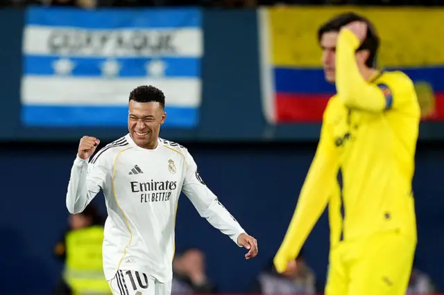 Kylian Mbappe celebrates after scoring