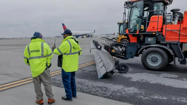 Officials display snow and ice removal equipment at Hartsfield-Jackson Atlanta International Airport as the Atlanta area prepares for the effects of a predicted large winter storm in Atlanta