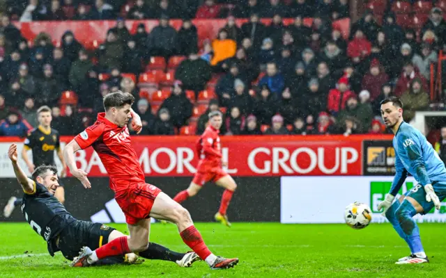 Kevin Nisbet scores