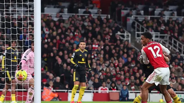 opening goal for arsenal going in to the nett