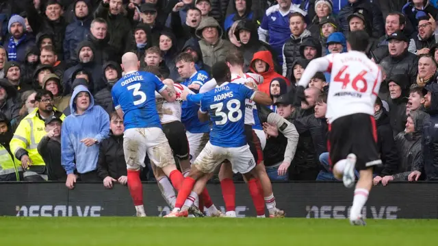 Tempers flare between Southampton's Flynn Downes, Portsmouth's Zak Swanson and team-mates