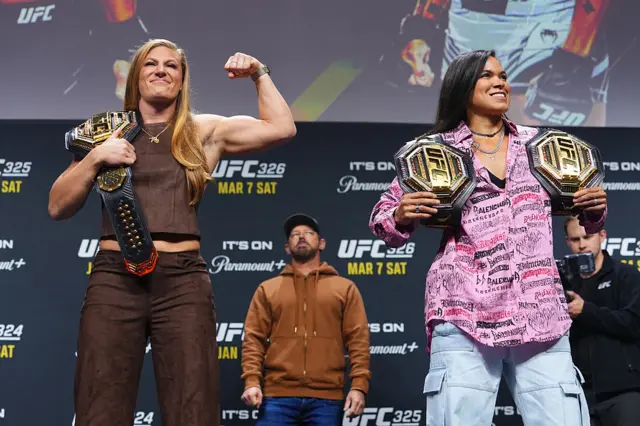 Kayla Harrison next to Amanda Nunes
