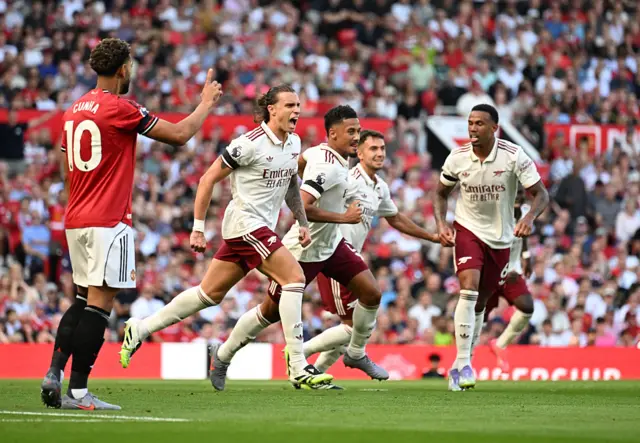 Riccardo Calafiori celebrates scoring winning goal for Arsenal at Manchester United