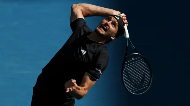 Alexander Zverev serves