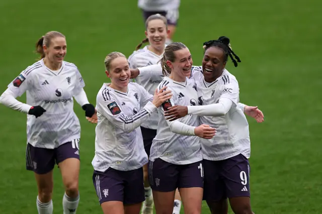 Elisabeth Terland celebrates with her teammates