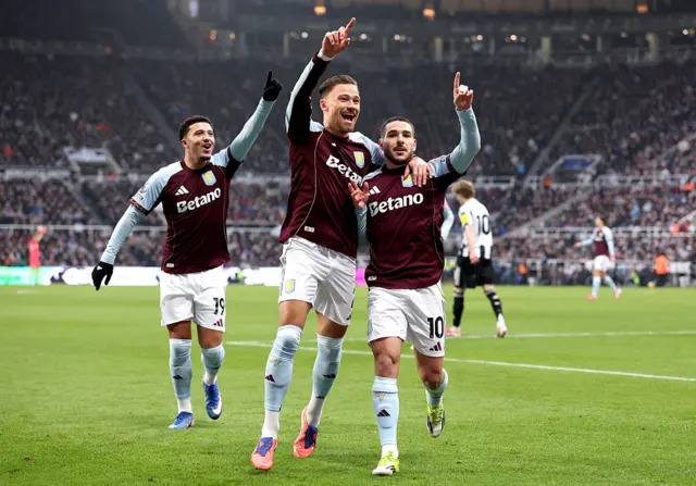 Aston Villa's Emi Buendia with Matty Cash and Jadon Sancho