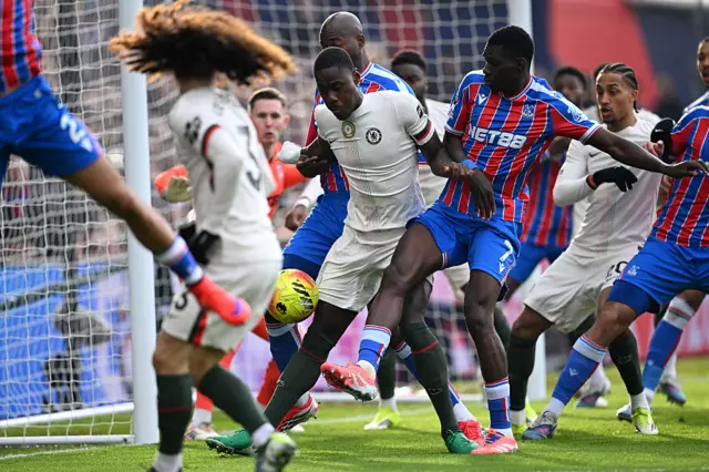 Trevoh Chalobah of Chelsea battles for possession with Ismaila Sarr