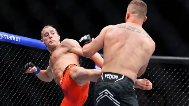 Paddy Pimblett kicks Justin Gaethje