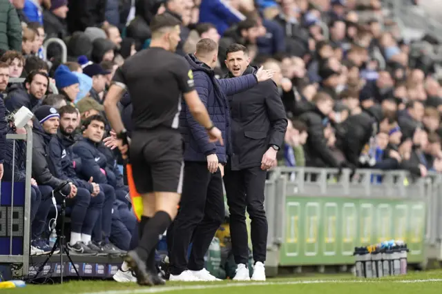 Portsmouth manager John Mousinho (right) and Southampton manager Tonda Eckert on the touchline