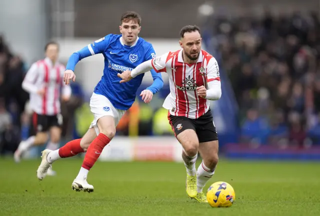 Southampton's Adam Armstrong (right) and Portsmouth's Zak Swanson