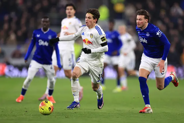 Aaronson runs clear of a defender