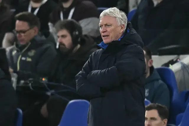 Moyes stands with his arms crossed