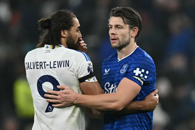 Calvert-Lewin and Tarkowski embrace and chat at full time