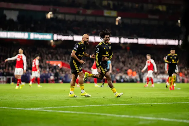 Patrick Dorgu and Bryan Mbeumo celebrate