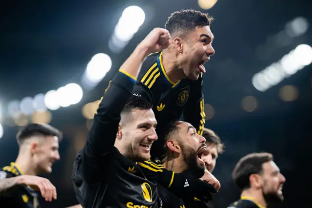 Manchester United players celebrate