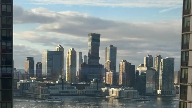 Broken cloud and blue skies over the Manhattan skyline
