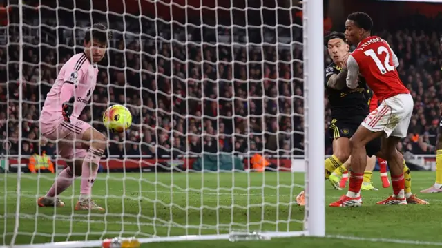 The ball rebounds in off Lisandro Martinez to hand Arsenal the opening goal against Manchester United