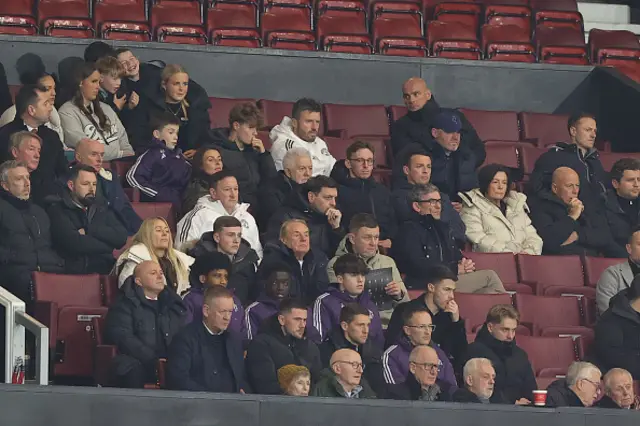Michael Carrick, caretaker head coach of Manchester United, Jason Wilcox, director of football at Manchester United, Wayne Rooney, Coleen Rooney, Jonny Evans, Alex Bruce, Darren Gibson, Steve Holland, assistant manager of Manchester United and Jonathan Woodgate, coach of Manchester United, watch on
