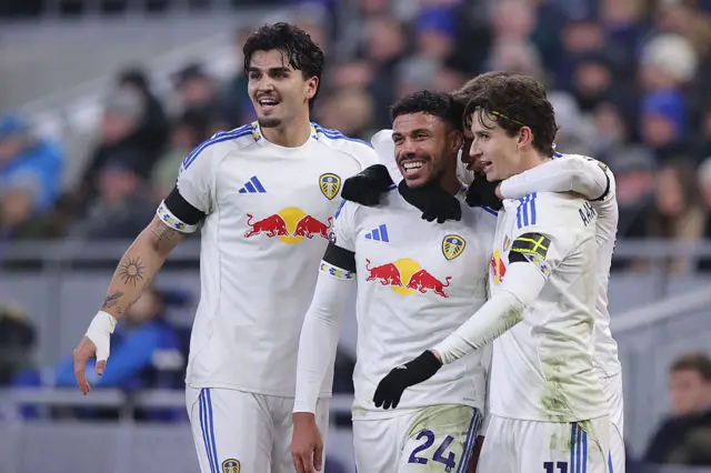 Leeds players congratulate Justin after his goal