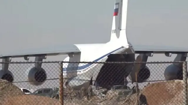A Russian transport plane seen inside the airport complex at Qamishli