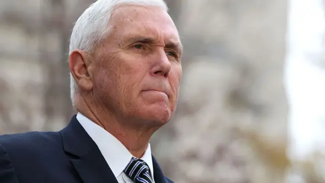 Close up shot of Mike Pence looking off camera