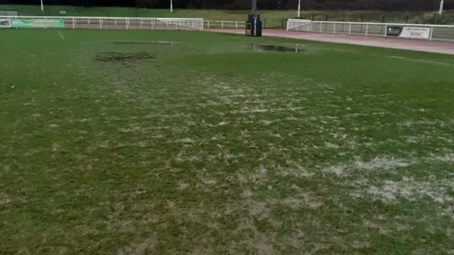 Puddles on the pitch at Enfield