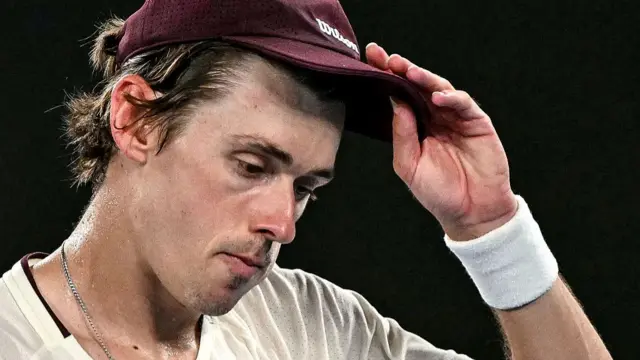 Alex De Minaur looks dejected