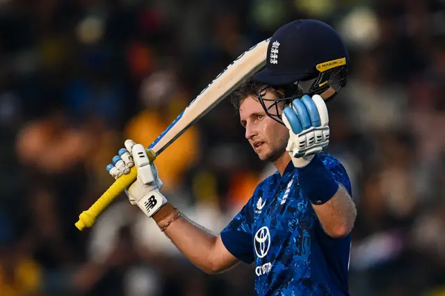 Joe Root celebrates his hundred