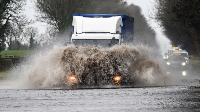 Truck drives through flood water in Northern Ireland