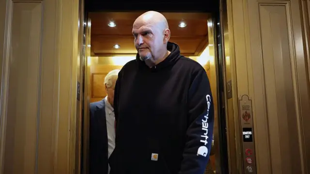 John Fetterman in dark hoody.