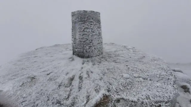 Summit of Yr Wyddfa/Snowdonia in ice and snow