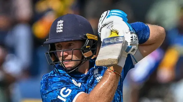 England's Joe Root plays a shot