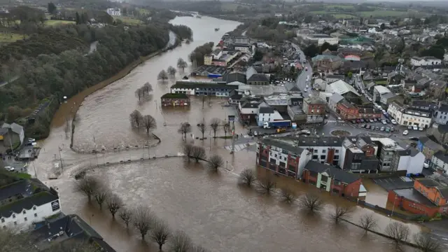 Enniscorthy as seen from the air. The river has burst its banks and the buildings nearest are flooded