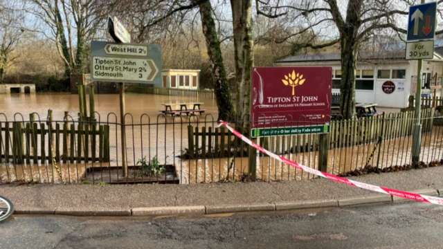 Outside of Tipton St John school in Ottery St Mary flooded.