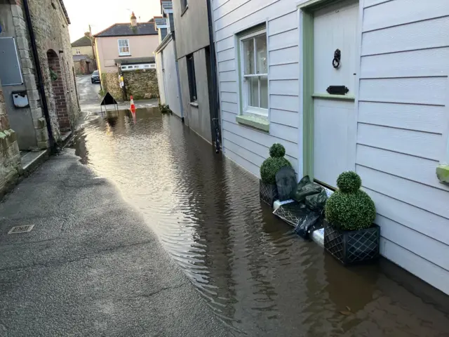 Flooding on a road in Lostwithiel, Cornwall