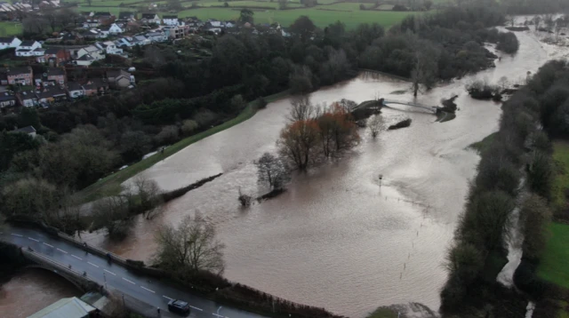 A done shot of the River Otter overflowing into neighbouring fields