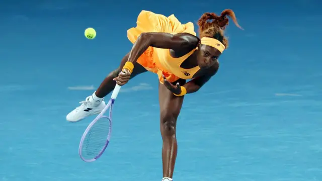 Coco Gauff serves