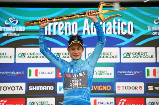 Jonas Vingegaard Hansen of Denmark and Team Visma-Lease A Bike celebrates at podium as race winner