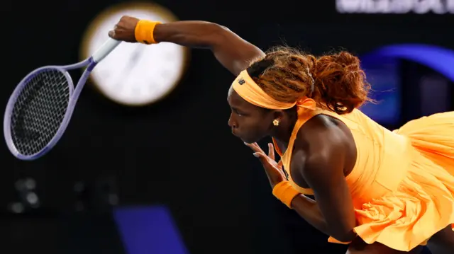 Coco Gauff serves