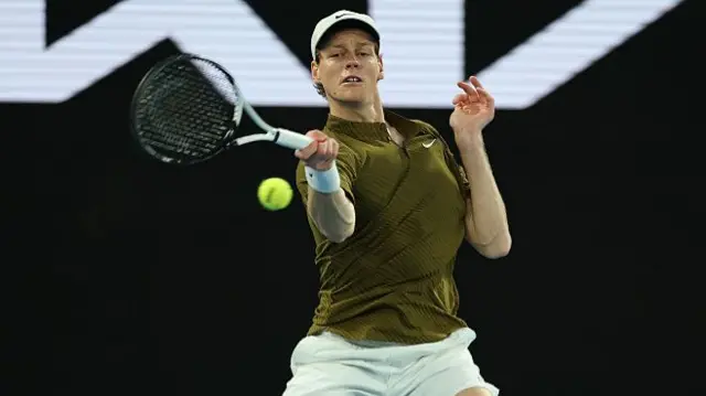 Jannik Sinner in action