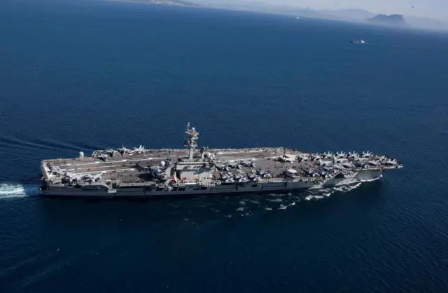 The USS Abraham Lincoln sails in open water
