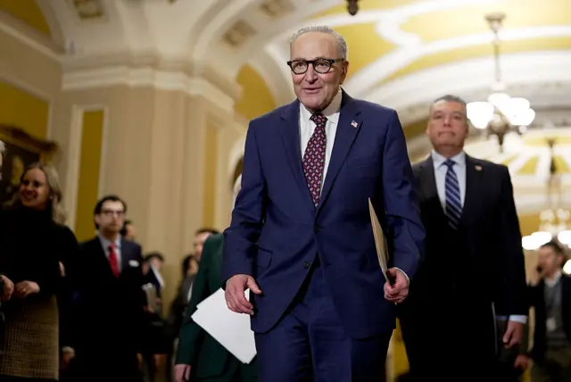 Senate Minority Leader Chuck Schumer, a Democrat from New York, arrives for a news conference following the weekly Senate Democrat policy luncheon