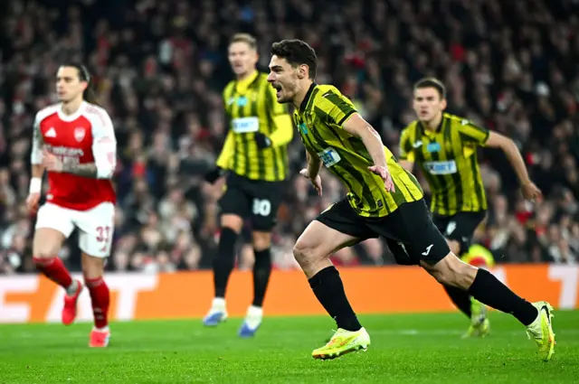 Jorginho of FC Kairat Almaty celebrates scoring his team's first goal from a penalty kick