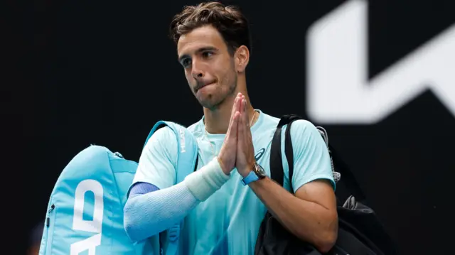 Lorenzo Musetti leaves court after retiring injured