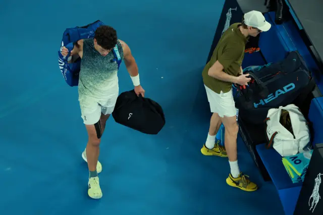 Ben Shelton leaves the court after his quarter-final defeat
