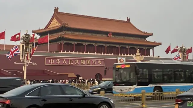 UK flag alongside China flag in Tiananmen Square